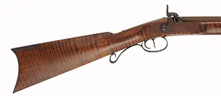 Hawken Rifle,
.54 caliber 36" Green Mountain barrel,
L&R percussion lock, iron, curly maple,
used, signed by George Nelson